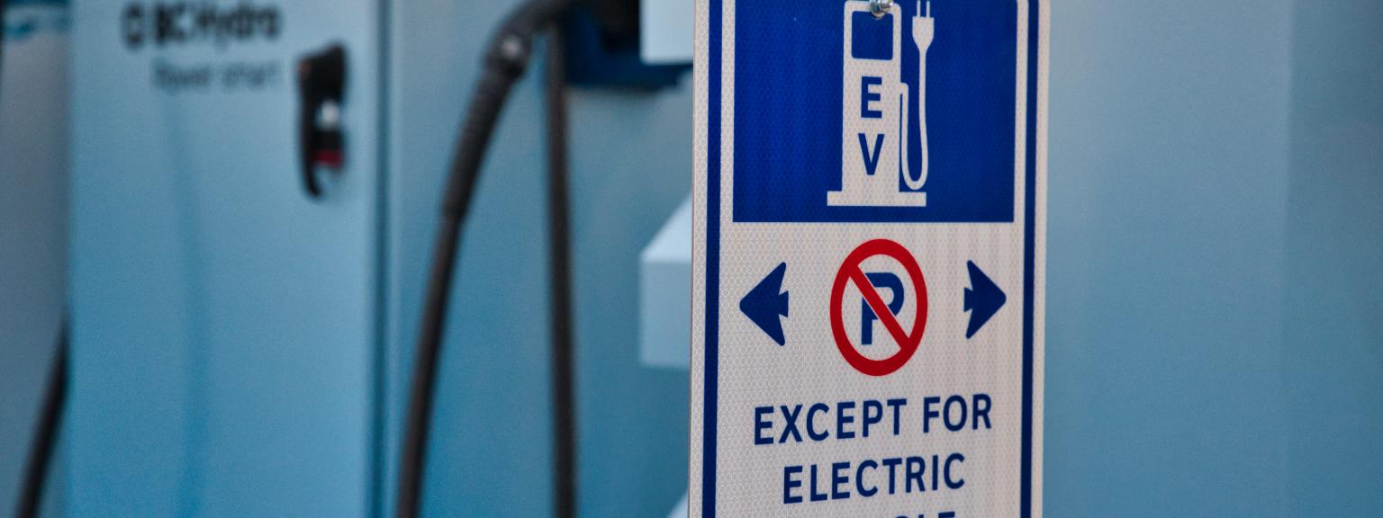 Sign says no parking "except for electric vehicle charging"