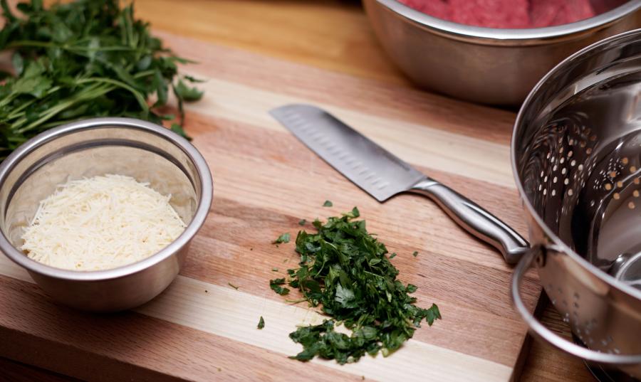 Food set out on a cutting board, ready to cook